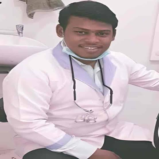 Dr Dhanraj T